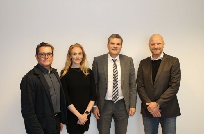 Með samstarfsfólki á ráðstefnu